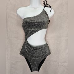 New Victoria’s Secret Pink One Shoulder Sillouete. One Shoulder Cutout One Piece Swimsuit. Black Shimmer Fabric Black. Glitter Design. Size: Medium New Never Worn. Retails: $54.95 Shimmer Stretch Bodysuit For Party, Party Shimmer Stretch Bodysuit, Party Bodysuit With Shimmer And Stretch, Glamorous Stretch Swimwear For Party, Glamorous Shimmer Bodysuit For Party, Glamorous Party Bodysuit With Shimmer, Glamorous Metallic Bodysuit For Night Out, Metallic Bodysuit For Summer Party, Summer Party Shimmer Bodysuit