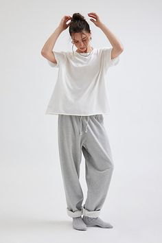 Better-than-basic Out From Under tee in a slouchy, oversized fit. Designed with a crew neckline, drop shoulders and short sleeves with raw, rolled edges for a relaxed finish. Only at Urban Outfitters. Features Out From Under Taylor oversized crew neck tee Oversized t-shirt Soft and stretchy knit Crew neckline with drop shoulders and short sleeves with raw, rolled edges Raw, rolled hemline Relaxed, oversized fit Regular length UO exclusive Content + Care 100% Cotton Machine wash Imported Size + F Oversized Cropped Crew Neck T-shirt For Everyday, Casual Solid Color Boxy Fit T-shirt, Relaxed Drop Shoulder Everyday T-shirt, Slouchy Short Sleeve Tops For Loungewear, Slouchy Relaxed Crew Neck Tops, Relaxed Cotton Tops With Loose Fit, Relaxed Fit Short Sleeve Top, Baggy Crew Neck Cotton Top, Baggy Cotton Crew Neck Top