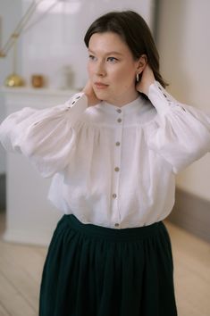 Step into the pages of history with our Edwardian Linen Blouse, a tribute to the refined elegance of the early 20th century. The attention to detail and vintage-inspired design make this band collar shirt a standout piece for those who appreciate the grace of historical fashion. This Victorian blouse with puff sleeves is a work of art, bringing together the best of peasant aesthetics and modern comfort.  Whether you're a history enthusiast or a bookish soul, our Dark Academia shirt suits for eve Classic Puff Sleeve Blouse With Button Cuffs, Classic Blouse With Puff Sleeves And Button Cuffs, Classic Linen Blouse With Buttons, Classic Bishop Sleeve Blouse With Button Cuffs, Classic Bishop Sleeve Blouse For Daywear, Classic Blouse With Bishop Sleeves And Button Cuffs, Classic Blouse With Bishop Sleeves For Daywear, Elegant Linen Blouse For Daywear, Elegant Long Sleeve Blouse For Gatherings