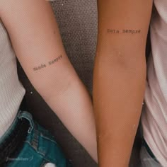 two people with tattoos on their arms that say, data semperve and