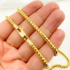 14k Solid Yellow Gold Foxtail Necklace  HIGH QUALITY FOXTAIL CHAIN This modern and on-trend design is crafted from genuine 14k solid gold Item number: 100FRFDT  Length: Available in 20, 22 & 24 Inch Thickness: 3mm Metal: 14k Solid Gold Quantity: Sold by Piece Purity: 14K (Stamped for Authenticity) Processing time: 1-2 business days FAST SHIPPING - It has a stamped ITALY. - Gold Jewelry Store NY sells only authentic solid 14K Gold. - We do not sell gold plated or gold-filled jewelry. - This is a Luxury Wheat Chain Necklace, Luxury 14k Gold Chain Necklace With Lobster Clasp, Luxury Wheat Chain Jewelry, Luxury Gold Wheat Chain Jewelry, Luxury Necklace With Wheat Chain As Gift, Luxury Necklace With Wheat Chain For Gift, Luxury Gold Jewelry With Wheat Chain, Gold Diamond-cut Chain Link Jewelry, Gold Diamond Cut Chain Link Jewelry