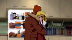 an animated image of two people hugging in the kitchen