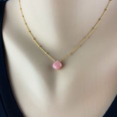 "Gold Opal Necklace Minimal Necklace October Necklace Delicate Necklace Simple Gold Necklace Pink Jewelry Women Necklace Best Friend Necklace Step up your everyday jewelry with a Pink Opal Pendant necklace. The faceted Pink Opal catches the light with every move and looks great with dressy or casual outfits. We have hand wrapped each stone with either 14K Gold-Filled, Sterling Silver or Oxidized Sterling Silver Wire before adding it to the Satellite Chain in coordinating materials. The chain is Delicate Pendant Crystal Necklace With Clavicle Chain, Feminine Delicate Chain Necklace, Feminine Hypoallergenic Gold Jewelry, Hypoallergenic Feminine Gold Jewelry, Feminine Pendant Necklaces With Delicate Chain, Feminine Round Pendant Jewelry Gift, Feminine Pendant Necklace With Delicate Chain, Dainty Crystal Necklace With Delicate Chain And Round Pendant, Feminine Gold Jewelry For Jewelry Making