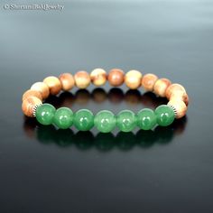 "❖ GREEN JADE: Natural 8mm gemstone ❖ ♥ Stability ♥ Longevity ♥ Fertility ♥ Serenity ♥ Wisdom ♥ Practicality ♥ Tranquility ♥ Balance ♥ Peace ♥ Harmony ♥ Moderation ♥ Perspective ❖ CEDAR WOOD: Natural 8mm wooden beads ❖ ♥ Strength ♥ Purification ♥ Spiritual protection ♥ Healing ❖ SPACERS: Antique pewter charms made in USA. ❖ Durable Elastic Stretch Cord. ❖ The gemstones are natural, so you may see some variations. ❖ Your purchase will arrive attractively packaged and ready to give. ❖ Size ❖ Women Green Jade Bracelet, Spiritual Protection, Peace And Harmony, Jade Bracelet, Antique Pewter, Cedar Wood, Green Jade, Nature Bracelets, Jade Green