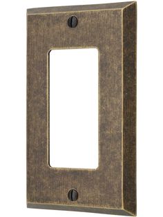 an old fashioned light switch plate on a white background