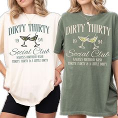 two women wearing dirty thirty and social club t - shirts, one in green and the other in white