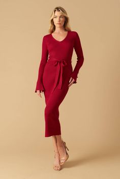 A ribbed sweater knit midi dress featuring V neckline, long sleeve with button detail and self sash belt Details: Self : 75% Viscose 25% Nylon Size & Fit - Model is 5`8" And Wearing Size Small- Measurements Taken From Size Small- Approx. Length: 49" Belted V-neck Midi Dress For Fall, Winter Midi Dress With Belt And Long Sleeves, Winter Long Sleeve Belted Midi Dress, Fall Long Sleeve Midi Dress With Tie Waist, Fall Midi Dress With Tie Waist, Sweater Midi Dress, What To Wear Fall, Sash Belt, Sweater Dress Midi