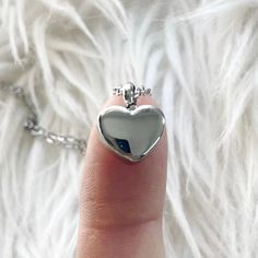 This dainty stainless steel heart urn necklace is a beautifully simple way to keep your loved ones close. Measuring just 10mm, this small yet meaningful cremation pendant is designed to hold a pinch of ashes, allowing you to carry a special memory wherever you go. Ideal for layering with other necklaces or wearing on its own, this discreet urn necklace has a hidden compartment to safely store your sacred keepsake. Though the heart itself is not hollow, it contains a small chamber to hold ashes o Urn Necklace, Urn Necklaces, Cremation Jewelry, Super Glue, Memorial Keepsakes, Memorial Jewelry, Simple Way, Favorite Jewelry, Accessory Gift