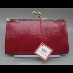 Nwt Baekgaard Out On The Town Scarlet Patent Leather Clutch Wallet Handbag Purse Item Attributes Brand: Baekgaard Bag Style: Clutch Closure Type: Kiss Lock Exterior Material: Patent Leather Condition: New With Tag (Nwt) Staining Inside: No Interior Measurements - In Inches: 8" X .5" X 5" Exterior Colors): Red Interior Color(S): Red, Multiple Colors Retails For $85 Red Handheld Clutch For Formal Occasions, Formal Red Bag With Fold Over Clasp, Red Formal Bag With Fold Over Clasp, Elegant Handheld Evening Wallet, Red Evening Bag With Removable Pouch For Formal Occasions, Red Pouch Evening Bag For Formal Occasions, Chic Red Evening Wallet, Red Clutch Wallet For Formal Occasions, Elegant Handheld Wallets For Daily Use