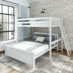 a white bunk bed sitting in front of a window next to a rug and chair