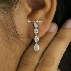 Pear Cut Liner Drop Earrings | 3.7 TCW Pear Cut Eco Friendly Lab Grown Diamond Earrings | Screw Back Delicate Drop Earrings | 14k White Gold | CVD Diamond Earrings | Pear Cut Lab Diamond | A Perfect Bridal Accessory Or An Anniversary Gift | Add A Touch Of Sophistication To Any Outfit. "𝐖𝐞 𝐚𝐫𝐞 𝐩𝐫𝐨𝐮𝐝 𝐭𝐨 𝐢𝐧𝐭𝐫𝐨𝐝𝐮𝐜𝐞 𝐭𝐡𝐞 𝐧𝐞𝐱𝐭 𝐠𝐞𝐧𝐞𝐫𝐚𝐭𝐢𝐨𝐧 𝐨𝐟 𝐄𝐜𝐨-𝐅𝐫𝐢𝐞𝐧𝐝𝐥𝐲 𝐋𝐚𝐛 𝐃𝐢𝐚𝐦𝐨𝐧𝐝𝐬. 𝐌𝐚𝐤𝐞 𝐲𝐨𝐮𝐫 𝐃𝐞𝐬𝐢𝐠𝐧𝐞𝐫 𝐉𝐞𝐰𝐞𝐥𝐫𝐲 𝐰𝐢𝐭𝐡 𝐦𝐢𝐧𝐢𝐧𝐠-𝐟? Gia Certified Pear Shaped Formal Earrings, Gia Certified White Gold Pear-shaped Earrings, Gia Certified Pear-shaped White Gold Earrings, Classic Teardrop Earrings Gia Certified, Elegant Gia Certified Teardrop Diamond Earrings, Classic Gia Certified Teardrop Earrings, Formal Pear-shaped Cluster Earrings With Prong Setting, Fine Jewelry Pear-shaped Diamond Earrings For Pierced Ears, Pear-shaped Diamond Earrings For Pierced Ears