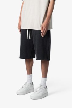 Our Ultra Baggy Sweatshorts are crafted from cotton fleece for unmatched quality and comfort. Featuring a garment-dyed fleece for a luxurious feel and these sweatshorts offer an ultra baggy, yet refined fit. The unique combination of a ultra baggy fit and contrast drawcord brings a modern twist to your every day wardrobe. details Style: Ultra Baggy Fit Style: Contrast Drawcord Composition: 100% cotton Model Info: 6’1, 140 lbs, wearing a size medium Washed Black Cotton Athleisure Bottoms, Black Relaxed Fit Shorts For Loungewear, Black Comfortable Cotton Sweats, Comfortable Black Cotton Sweats, Casual Cotton Sweats With Boxy Fit, Black Cotton Sweats For Leisure, Casual Washed Black Cotton Shorts, Washed Shorts For Streetwear In Short Length, Black Cotton Comfy Sweats