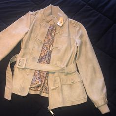 Belted Bomber Jacket From Forever 21, Never Been Worn. Still Has The Tags And Spare Button. Floral Lining, Soft Material That Mimics Suede. Make Me An Offer! Spring Collared Belted Outerwear, Spring Single Breasted Button-up Outerwear, Spring Single-breasted Button-up Outerwear, Trendy Beige Outerwear With Double Button Closure, Spring Collared Outerwear With Double Button Closure, Casual Spring Utility Jacket With Belt, Trendy Khaki Outerwear With Snap Buttons, Casual Belted Utility Jacket For Spring, Casual Belted Utility Jacket For Fall