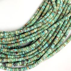 "✦Gemstone: Genuine Natural Turquoise ✦Color: Turquoise Blue / Green ✦Shape: Heishi / Disc ✦Size: 4x3mm ✦Length: 16\" inches strand ♕Beautiful & High Quality Beads♕ You will get similar Stone because of the natural stones. PLEASE NOTE: We can guarantee you that these stones are 100% natural!  If you are not satisfied with your beads, you may return them within 7 days of delivery for a refund. We ship orders every day from Monday to Saturday, aiming to ship your order on the same day or the next Green Heishi Bead Jewelry With Gemstone Beads, Green Southwestern Jewelry With Spacer Beads, Southwestern Green Jewelry With Spacer Beads, Southwestern Style Green Jewelry With Spacer Beads, Adjustable Turquoise Gemstone Necklace, Turquoise Heishi Beads Round Jewelry, Turquoise Heishi Beads Jewelry, Adjustable Green Turquoise Necklace With Spacer Beads, Hand-strung Turquoise Heishi Beads Necklace