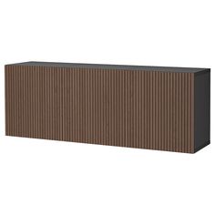 a brown and black cabinet sitting on top of a white wall