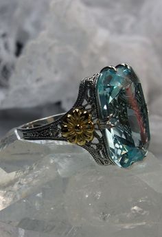 Excited to share the latest addition to my #etsy shop: Sim Aquamarine Sterling Silver Deco Floral Golden Daisy Filigree Ring Size (Made To Order) Design#208 https://etsy.me/2z1gBvs #jewelry #ring #silver #no #yes #girls #blue #aquamarine #floral Edwardian Ring, Art Nouveau Floral, Order Design, Gem Ring, Deco Floral, Sterling Silver Filigree, Blue Gems, Aquamarine Rings, Silver Art