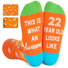 two pairs of socks that say, 22 what year old an awesome person is like