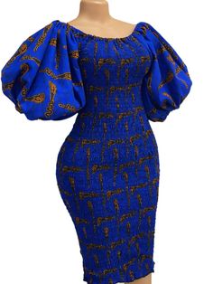 Experience the blend of style and comfort with our Puff Sleeves African Print Smocked Midi Dress in Blue! The chic and vibrant print, combined with the airy and flowy puff sleeves, will make you stand out on any occasion. Midi Dress Blue, Ankara Styles, Blue Midi Dress, The Chic, Dress Blue, African Print, Puff Sleeves, Smocking, Puff Sleeve