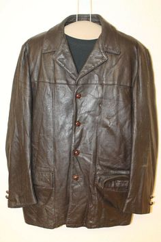 MENS BAUER VTG BROWN LEATHER INSULATED CAR COAT/JACKET SZ 40 ITEM FEATURES Brand: BAUER VINTAGE BROWN LEAHER CAR COAT/JACKET 4 BUTTONS INSULATED  Material           Outside: Leather             Liner:   NYLON/ REMOVABLE INSULATED LINER          Condition         Outside: Very Good. Minor nicks and scuffs.  (see pictures)         Liner: Very Good  (see pictures) Size: 40 (Sizes vary between brands and eras, so please use the measurements below for a better gauge of actual size.) Measurements (mea Brown Leather Jacket For Business With Long Sleeves, Brown Sport Coat With Buttons For Fall, Brown Buttoned Sport Coat For Fall, Brown Long Coat Blazer With Buttons, Brown Long Coat Blazer, Classic Vintage Brown Leather Outerwear, Classic Brown Leather Sport Coat, Brown Business Outerwear With Buttons, Brown Leather Jacket With Buttons For Winter