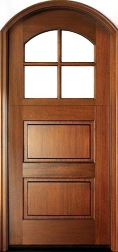 a wooden door with an arched glass