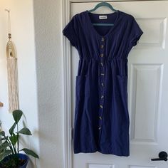 Dressbarn Navy Button Down Dress With Pockets - Like New! Washed But Never Worn! Casual Cotton Midi Dress With Buttons, Casual Button Back Midi Dress, Casual Cotton Dress With Button Back, Casual Midi Length Dress With Button Back, Blue Button-up Cotton Midi Dress, Blue Cotton Button-up Midi Dress, Cotton Midi Dress With Button Closure For Day Out, Navy Casual Dress With Pockets, Navy Buttoned Midi Dress For Spring