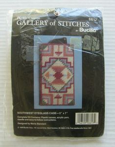 the package is packaged for needleing and has an image of a cross stitch pattern on it