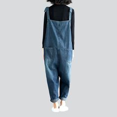 Make a statement this season with our new-millennium-style 2023 Autumn Collection Patchwork Denim Jumpsuit! Boasting a loose fit. patchwork-style design. and suspenders closure. this one-of-a-kind piece is perfect for those who want to stay ahead of the trend.Distinctive Features: Y2K Style: Take a trip back in time with our vintage-inspired Y2k-style denim jumpsuit! Patchwork Design: Our denim jumpsuit features patchwork-style patches on the legs for a unique. edgy look. Baggy Fit: Our jumpsuit Blue Denim Overall Jumpsuit With Pockets, Blue Baggy Straight Leg Overalls, Baggy Blue Straight Leg Overalls, Casual Denim Patchwork Jumpsuit, Denim Blue Bib Front Jumpsuit And Rompers, Fall Medium Wash Bib Front Denim Jumpsuit, Casual Denim Blue Bib Front Overalls, Denim Bib Front Overalls, Casual Denim Patchwork Overalls Jumpsuit