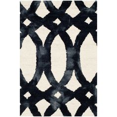 a black and white rug with an abstract design on the bottom, in front of a white background