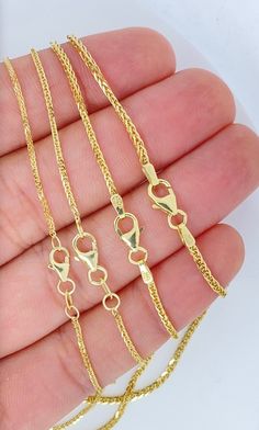 We have added new 14K Gold Chains to our jewelry lineup! These are the nicest most economically priced Genuine Solid 14K Gold Chains available for sale on the internet! I guarantee that you will not be disappointed  Solid 14K Gold Chain are high quality and guaranteed to be cherished forever! Trending Diamond Cut Wheat Link! Sparkles in Light! Perfect for pendants! DURABLE! Perfect for Stacking! Not Plated or Filled or Vermeil! 100% Genuine Solid 14K Gold Metal: Gold Purity: 14K (Stamped 14KT for Authenticity) Stamped ITALY for Country of Origin! HIGH QUALITY! Width: 1.25mm 1.5mm 1.75mm 2mm Length: 16inch, 18inch, 20inch, 22inch, 24inch Country of Origin: ITALY Exact chain available in Solid 18K Gold as well on a different listing.  Certain sizes are available in 14K Rose Gold or 14K White Gold-plated Jewelry With Wheat Chain, 14k Gold Wheat Chain Jewelry For Anniversary, Yellow Gold Wheat Chain Jewelry For Anniversary, Gold Wheat Chain Jewelry For Anniversary, Real Gold Chains, Trendy Necklaces, Jewelry Business, Diamond Cut, Gold Chain