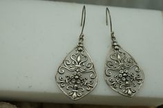 This is the perfect option for those who like cool, unique jewelry and the luxury, shine of silver. The pierced earrings have a shape of drops. The earrings have filigree design and the earrings are decorated with crystals. It is perfect for a gift for birthday, mother's day and holidays. ❤️ The earrings are about 1 2/4'' by 7/8''(in the widest place). ❤️ There is a hallmark: 925.Thailand. Everyone interested in the jewelry should remember that he or she must like their jewelry- not just at firs Silver Dangle Plug Earrings For Gifts, Silver Plug Earrings As Gift, Antique Silver Pierced Sterling Silver Earrings, Handmade Silver Plug Earrings For Anniversary, Silver Sterling Silver Teardrop Plug Earrings, Silver Teardrop Sterling Silver Plug Earrings, Silver Sterling Silver Plug Earrings Gift, Silver Teardrop Plug Earrings As A Gift, Sterling Silver Plug Earrings As A Gift