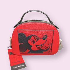 Brand New With Tags Coach Disney Mickey Mouse Red & Black Double Zip Closure, Fabric Lining Handle With 2" Drop Outside Slip Pocket Detachable Crossbody Wear Length: (8 1/4") High: (5 3/4") Trendy Red Coach Bag, Red Minnie Mouse Bag For Daily Use, Disney Red Rectangular Bag, Disney Red Rectangular Bags, Red Minnie Mouse Bag For Gift, Red Minnie Mouse Bag For Disney Fan Events, Trendy Red Bags For Disney Trips, Red Minnie Mouse Bags, Coach Zip Top Tote