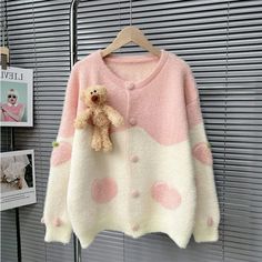 Stay cozy and cute with this adorable bear embroidered cardigan! Made with soft mink-like wool, this collarless cardigan is perfect for work or casual outings. Available in one size and in a lovely shade of pink, this sweater is a great addition to your fall/winter wardrobe! 🔥🐻❄️ #BearEmbroideredCardigan #MinkLikeWool #KnittedCardigan #FallFashion #WinterWardrobe Kawaii Crochet Cardigan, Cute Crew Neck Cardigan, Cute White Crew Neck Cardigan, Cute Fall Crew Neck Outerwear, Cute Crew Neck Fall Outerwear, Cute Spring Crew Neck Cardigan, Cute Crew Neck Spring Cardigan, Cute Long Sleeve Knit Cardigan, Cute Long Sleeve Cardigan