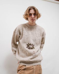 Cool vintage 80s cream nordic cable knit snowflake jumper. Size L, looks cool oversized. Pit to pit 48in, shoulders 24in and length 28in. No inside size label. Material 72% wool and 28% alpaca. Made in Italy. Model usually wears size S and 183cm tall. Great condition, keep in mind that it is vintage item and signs of natural wear/age might appear. If you have any questions about item don't hesitate to message us.  When buying from HungerVintage you support small sustainable bussiness.  Thank you Oversized Vintage Cable Knit Sweater, Vintage Beige Chunky Knit Sweater, Oversized Vintage Cream Sweater, Cream Cable Knit Vintage Sweater, Vintage Cable Knit Crew Neck Sweater, Knit Snowflake, Nordic Fashion, Leather Button Up, Mens Pullover