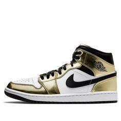 The Air Jordan 1 Mid SE ‘Metallic Gold’ is the perfect sneaker to add some luxury to your style. The white leather upper is contrasted by metallic gold overlays and black hits on the Swoosh and collar, creating a look that will turn heads. With Jumpman iconography woven into the tongue tag and classic Wings logo stamped on the lateral collar flap, this mid-top sneaker has all of the details covered. And don’t forget about the encapsulated Nike Air cushioning in the heel – it ensures a comfortable, luxurious ride. (AJ1/SNKR/Retro/Men's/High Top/Basketball) Luxury High-top Sneakers With Boost Midsole For Sports, Luxury High-top Sneakers With Boost Midsole For Streetwear, Luxury Leather High-top Basketball Shoes, Luxury Basketball Shoes, Luxury High-top Sneakers With Boost Midsole, Luxury Round Toe Basketball Shoes For Streetwear, Classic Gold Sneakers For Streetwear, Gold Sporty Basketball Shoes, Luxury Lace-up Basketball Shoes