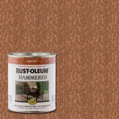 rustoleum hammered exterior paint in a brown tin with an orange stain on it