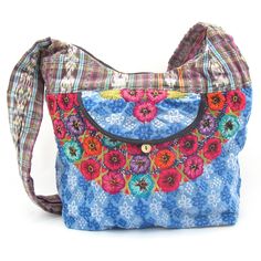 Eco- friendly and fashionable recycled Guatemalan purse. Produced under fair trade principles. Each purse is uniquely designed from recycled hand embroidered and handwoven fabrics from the Mayan women's traditional dress.Fully lined with inside pocket. Front pocket. 15.5" L x 12h x 5.5 w. Strap is 36". Bohemian Cotton Bag With Floral Embroidery, Bohemian Cotton Bags With Floral Embroidery, Traditional Handwoven Hobo Bag, Multicolor Embroidered Cotton Shoulder Bag For Everyday Use, Multicolor Handwoven Cotton Shoulder Bag, Traditional Patchwork Shoulder Bag For Everyday, Everyday Multicolor Embroidered Cotton Shoulder Bag, Bohemian Cotton Shoulder Bag For Market, Bohemian Cotton Shoulder Bag With Multicolor Embroidery