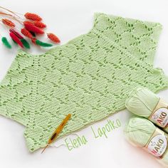 the crochet pattern is next to yarn and needles