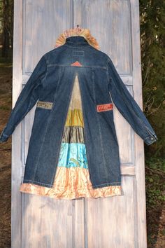 Denim jacket with a denim coat | Etsy Hippie Patchwork Denim Jacket For Fall, Festival Denim Patchwork Outerwear, Bohemian Winter Denim Jacket With Patchwork, Bohemian Patchwork Denim Jacket For Winter, Bohemian Patchwork Denim Jacket For Fall, Hippie Long Sleeve Denim Outerwear, Bohemian Denim Outerwear With Pockets, Hippie Denim Outerwear For Festivals, Fitted Bohemian Denim Outerwear