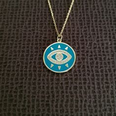 Brand New With Tags Stella Rose Evil Eye Pendant Necklace Excellent Condition With No Flaws 18k Gold Plating Over 925 Sterling Silver Chain Length Approx 16" With 2" Extender Pendant Diameter Approx 3/4" Gold Disc With Turquoise Colored Enamel And A Gold Evil Eye With Pave Crystals And Gold Rays Emanating From The Eye (Or Some May Say Gold Eyelashes) Spring Ring Closure Please No Trades Or Lowballs! *Ask Any Questions You May Have Prior To Making An Offer Or Purchase Please* Blue Round Pendant Jewelry, Tarnish Resistant, Blue Tarnish-resistant Round Pendant Jewelry, Blue Tarnish Resistant Pendant Jewelry, Blue Tarnish-resistant Pendant Jewelry, Rose Gold Evil Eye Necklace Gift, Blue Charm Necklaces With Adjustable Chain, Blue Sterling Silver Charm Necklace With Adjustable Chain, Blue Pendant Charm Necklace For Gift, Blue Pendant Jewelry With Adjustable Chain