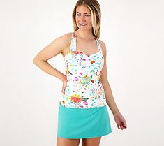 Take the plunge this summer and update your swimwear with this comfort strap tankini and skirted bottom. Whether you're splashing around in the pool or soaking up some sun at the beach, this coordinated combination provides the comfort and coverage you crave. From Jantzen. Summer Swim Skirt With Built-in Bra, Spring Vacation Swim Dress With Built-in Bra, Summer Swim Skirt With Built-in Bra For Pool, Green Tankini With Built-in Bra For Summer, Summer Beachwear Tankini With Built-in Bra, Beach Season Swim Skirt With Built-in Bra, Summer Swim Skirt With Built-in Bra For Vacation, Tropical Swimwear With Upf 50+ Protection, Tropical Swimwear With Upf 50+ For Spring