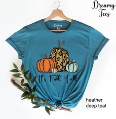 It's Fall Y'all Shirt, Fall Shirt, Pumpkin Shirt , Cute Fall Tshirt, Fall Mom Shirt, Fall Teacher Shirt, Women's Fall Shirt, Gift For Her--- SIZING AND COLOR ---Listing photos contain colors and measurements for both women's v-neck and unisex crew neck shirts. Please be careful of which style you select from the drop down menu and double-check your measurements to make sure you order the proper size all since we do not offer returns/exchanges. We make each shirt to order and all sales are final. Blue Pre-shrunk T-shirt For Fall, Blue Screen Print T-shirt For Fall, Blue T-shirt With Screen Print For Fall, Fall Blue Shirt With Letter Print, Blue Letter Print T-shirt For Fall, Blue Letter Print Shirt For Fall, Blue Shirt With Letter Print For Fall, Fall Funny Print Short Sleeve Tops, Blue Graphic Tee For Fall