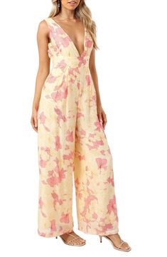 A dreamy floral print covers this lightweight jumpsuit designed with flowy wide legs and a flirty plunging neckline. Hidden side-zip closure; ties at back Plunge neck Sleeveless Side-seam pockets Lined 70% viscose, 30% nylon Hand wash, dry flat Imported Wide Leg Jumpsuits And Rompers For Spring Beach, Wide-leg Jumpsuits And Rompers For Spring Beach, Wide Leg Jumpsuits For Beach In Spring, Summer Floral Print V-neck Jumpsuits And Rompers, Summer V-neck Jumpsuits And Rompers With Floral Print, Summer Jumpsuit With Floral Print And V-neck, Flowy V-neck Jumpsuits And Rompers For Summer, Spring Beach Flowy Jumpsuits And Rompers, Spring Vacation Flowy Jumpsuits And Rompers