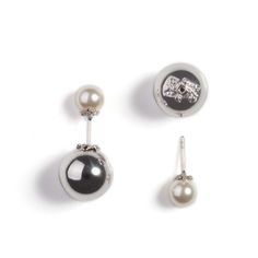 Stud earrings featuring a sterling silver orb and a Swarovski elements pearl. ‘LAY!’said The Giant is a collection inspired by the children’s fairytale ‘Jack and the Beanstalk’. The jewellery features Swarovski Elements Pearls which represent the magic beans, and golden orbs symbolic of the golden eggs laid by the Giant’s prized hen. Classic jewellery based on a classic fairytale with a modern twist. Sterling sliver.Also available in gold with a dark grey pearl or silver with an ivory pearl. Elegant Silver Orb Jewelry, Luxury Silver Single Pearl Earring, Elegant White Orb-shaped Jewelry, Elegant Silver Orb Earrings, Silver Orb Earrings For Gift, Magic Beans, Classic Jewellery, Claw Earrings, Jack And The Beanstalk