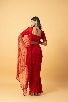 Red soft net & georgette saree with hand embroidery. Hand embroidery consists of red coloured cutdana, tiki, thread work etc Red Georgette Pre-draped Saree With Pallu, Red Georgette Pre-draped Saree With Sheer Dupatta, Red Semi-stitched Pre-draped Saree With Resham Embroidery, Red Pre-draped Saree With Resham Embroidery For Diwali, Red Embroidered Pre-draped Saree, Red Georgette Blouse Piece For Navratri, Red Lehenga With Sheer Dupatta In Chinon, Festival Red Georgette Blouse Piece, Fitted Red Georgette Blouse Piece