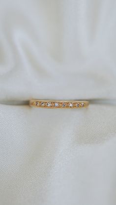 * Ring Material: Diamond, 14K Yellow Gold  * Ring Dimensions:0.5 Inch Top Design, 2MM Band * Size: 6 * Stone Weight & sizes: Diamond - 0.05ct  * Overall weight: 1.7g 14k Gold Bands With Diamond Accents, Dainty Wedding Ring With Pave Setting, Luxury Yellow Gold Stackable Rings With Diamond Accents, Heirloom 14k Rose Gold Diamond Ring In Yellow Gold, 14k Gold Wedding Band With Diamond Accents, Classic Gold Stackable Rings With Pave Setting, Heirloom 14k Rose Gold Diamond Ring In Gold Color, Gold Diamond Ring With Channel Set, Heirloom Diamond Bands In Yellow Gold