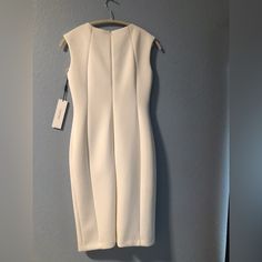 Calvin Klein Ivory Dress With Gold Hardware. Brand New! Classic White Sheath Mini Dress, Fitted White Calvin Klein Mini Dress, Calvin Klein White Fitted Mini Dress, White Fitted Calvin Klein Mini Dress, Fitted White Calvin Klein Midi Dress, Elegant White Calvin Klein Midi Dress, Calvin Klein White Sheath Midi Dress, Elegant White Calvin Klein Dress, Calvin Klein White Fitted Midi Dress