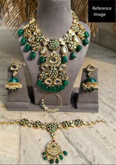 This beautiful necklace set is great for South Asian pre-wedding events, wedding events, parties and other traditional ceremonies! This set is not only great for brides but also wedding guests and bridesmaids who want to add a statement jewelry piece to their outfits! This kundan necklace set features a choker necklace with a pendant, a pair of jhumki earrings and a mathapatti/sheeshphool. NOTE NATH (NOSE RING) NOT INCLUDED!! This kundan necklace set is golden in base, has simulated kundan, has Green Kundan Necklaces For Wedding, Bollywood Style Necklace With Latkans For Wedding, Bollywood Style Wedding Necklaces With Latkans, Bollywood Style Necklaces With Latkans For Wedding, Bollywood Necklaces With Latkans For Wedding, Green Kundan Necklace With Cutdana For Wedding, Kundan Necklace For Wedding And Festivals, Wedding Jewelry Sets With Latkans For Festivals, Green Kundan Jhumkas For Wedding