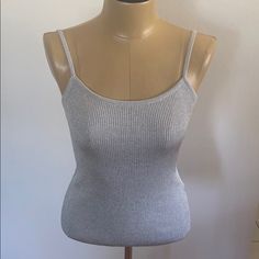 Super Cute Gap Sparkly Tank Top. Stretchy. Nwot Light Blue/Grey Color 95% Rayon 5% Metal Approximate Measurements L 18.8” Bust 13.1” Strap Drop 8” Smoke And Pet Free Home A7 Trendy Fitted Tank Top From Gap, Trendy Fitted Tank Top By Gap, Trendy Fitted Gap Tank Top, Sparkly Tank Top, Blue Grey Color, Grey Tank Top, Gray Tank, Grey Color, Blue Grey