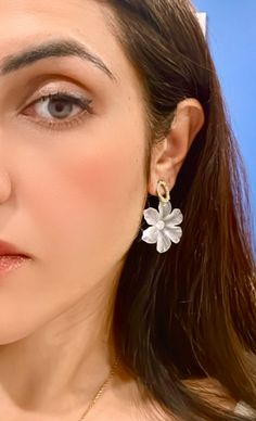 The Floral acrylic earrings are not only beautiful but also versatile, suitable for both casual and formal occasions. They are lightweight and comfortable to wear, making them a perfect accessory for any outfit. These gorgeous white earrings are the perfect gift for anyone who appreciates natural beauty and unique jewelry. Free Estimated Delivery: 3-4 Days Delivery Trendy Flower Earrings For Wedding, Trendy Flower-shaped Earrings For Wedding, White Chic Clip-on Earrings For Gift, Trendy White Drop Pearl Earrings, Trendy White Pearl Drop Earrings, Chic White Clip-on Earrings For Gift, Chic White Clip-on Earrings Gift, Elegant White Pearl Earrings For Summer, Trendy White Drop Clip-on Earrings