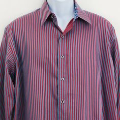 Men's Robert Graham Blue & Red Striped Dress Shirt Flip Cuffs, Spread Collar, Long Sleeves. Knowledg Wisdom Truth tag. Made in India Size - Large Condition - Preowned - Extra buttons still attached. No stains, holes or tears. Measurements Pit to pit - 24.25" Shoulder to cuff - 25.25" Shoulder to hem - 27" Formal Red Dress Shirt With Spread Collar, Red Formal Dress Shirt With Spread Collar, Red Long Sleeve Dress Shirt For Business, Red Button-up Dress Shirt For Business, Red Long Sleeve Dress Shirt For Formal Occasions, Business Red Cotton Dress Shirt, Red Cotton Dress Shirt For Business, Red Cotton Business Dress Shirt, Red Striped Dress